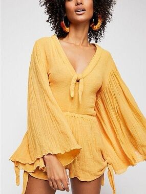 Jen’s Pirate BootWomen’s Mustard Yellow V-Neck Textured Romper with Bell Sleeves